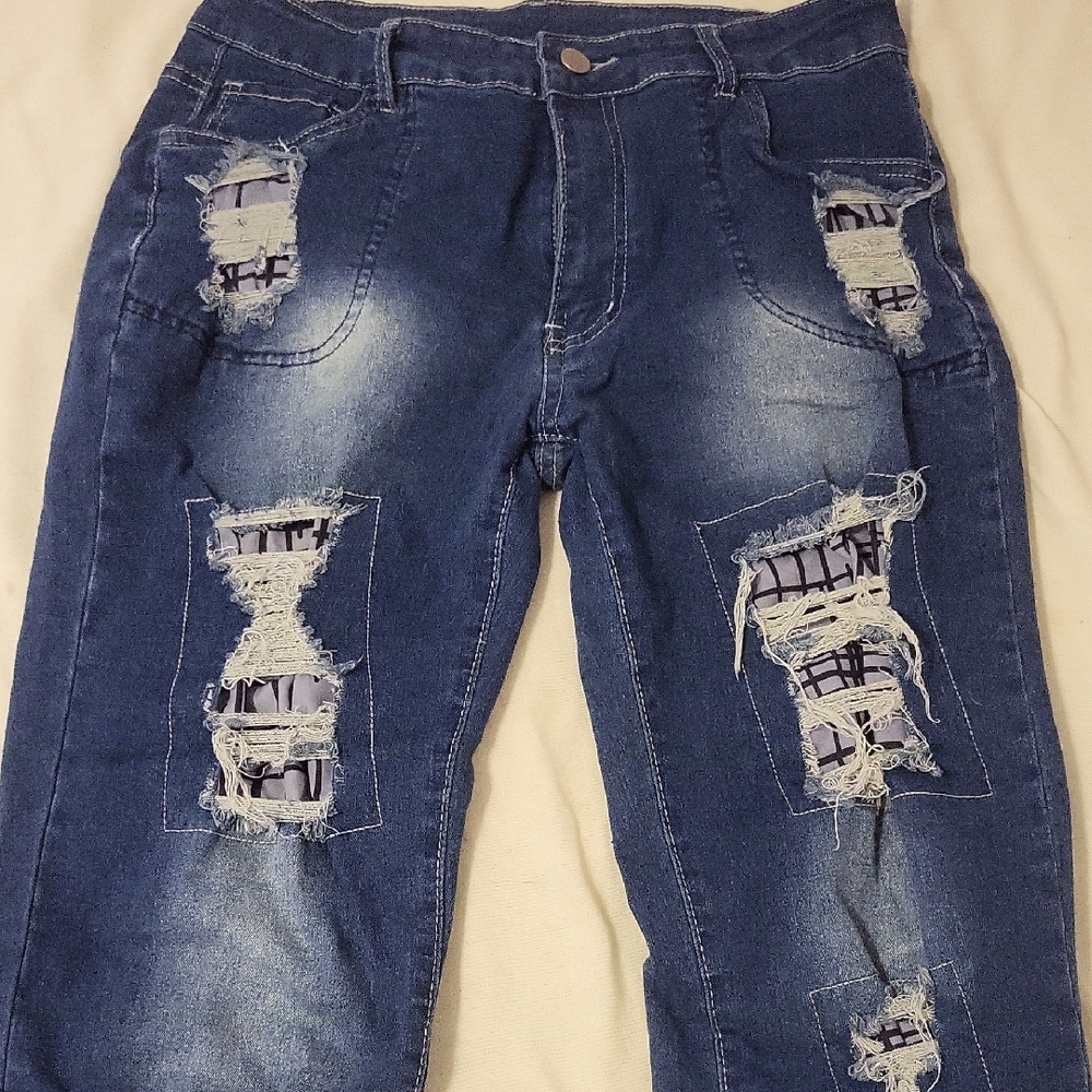 Gender Neutral Distressed Blue Jeans